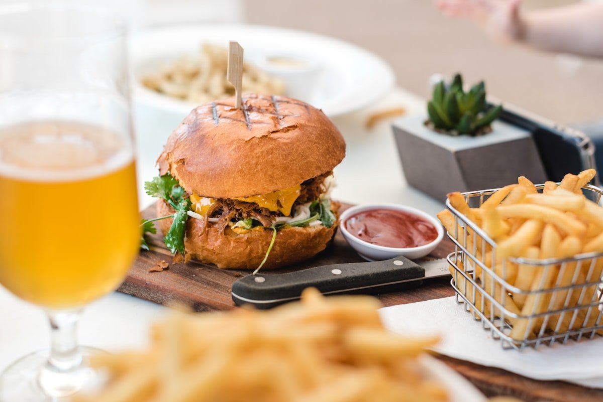 Burger and fries fresh off the grill, built for matchday